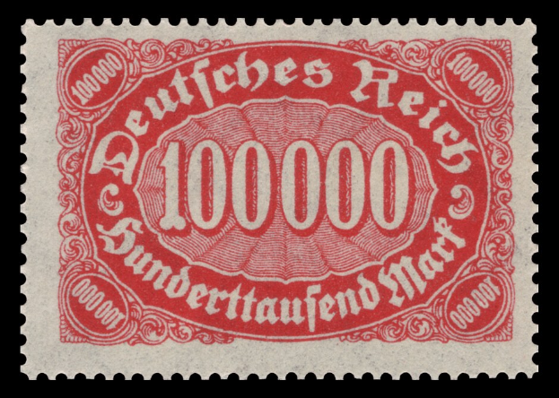 Ein roter Stempel mit der Aufschrift "Deutsches Reich" vor schwarzem Hintergrund.