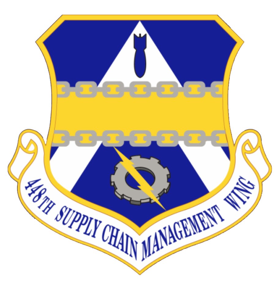 Logo der 48. Versorgungsmanagementstaffel mit einem blauen Schild mit einem weißen Stern und einem weißen Banner mit der Aufschrift "Versorgungsmanagement" in Blau, alles von einem weißen Rand umgeben und der Text in fetter schwarzer Schrift.