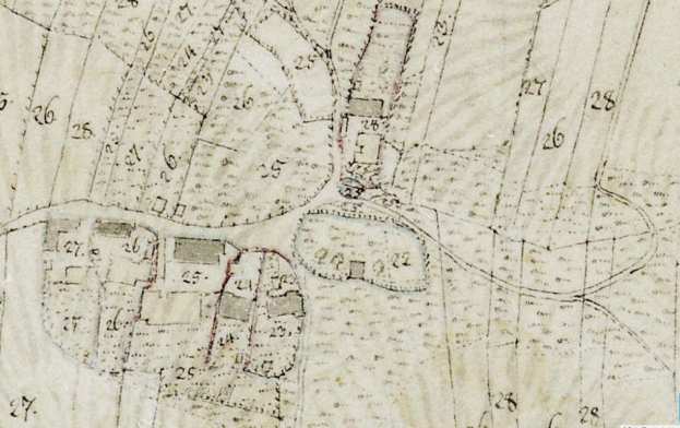 Detailierte alte Stadtkarte, die den geplanten Entwicklungsstandort mit nummerierten Gebäuden, Straßen und Textanmerkungen zeigt.
