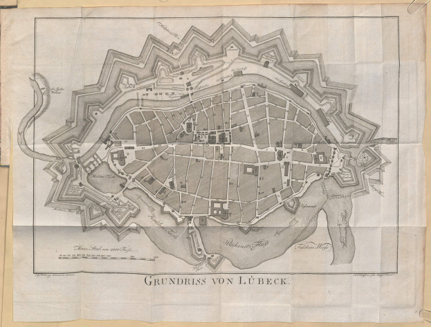 Ein detailliertes altes Stadtplan von Lübeck, Deutschland, das Straßen, Gebäude und Sehenswürdigkeiten mit Textbeschriftungen zeigt.