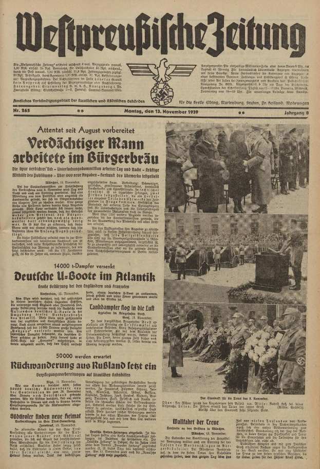 Schwarze und weiße Titelseite einer deutschen Zeitung vom 13. November 1939 mit der Überschrift 'Weitpreubliche Zeitung', die eine Gruppe von Menschen in traditioneller deutscher Kleidung in einer feierlichen Umgebung zeigt.