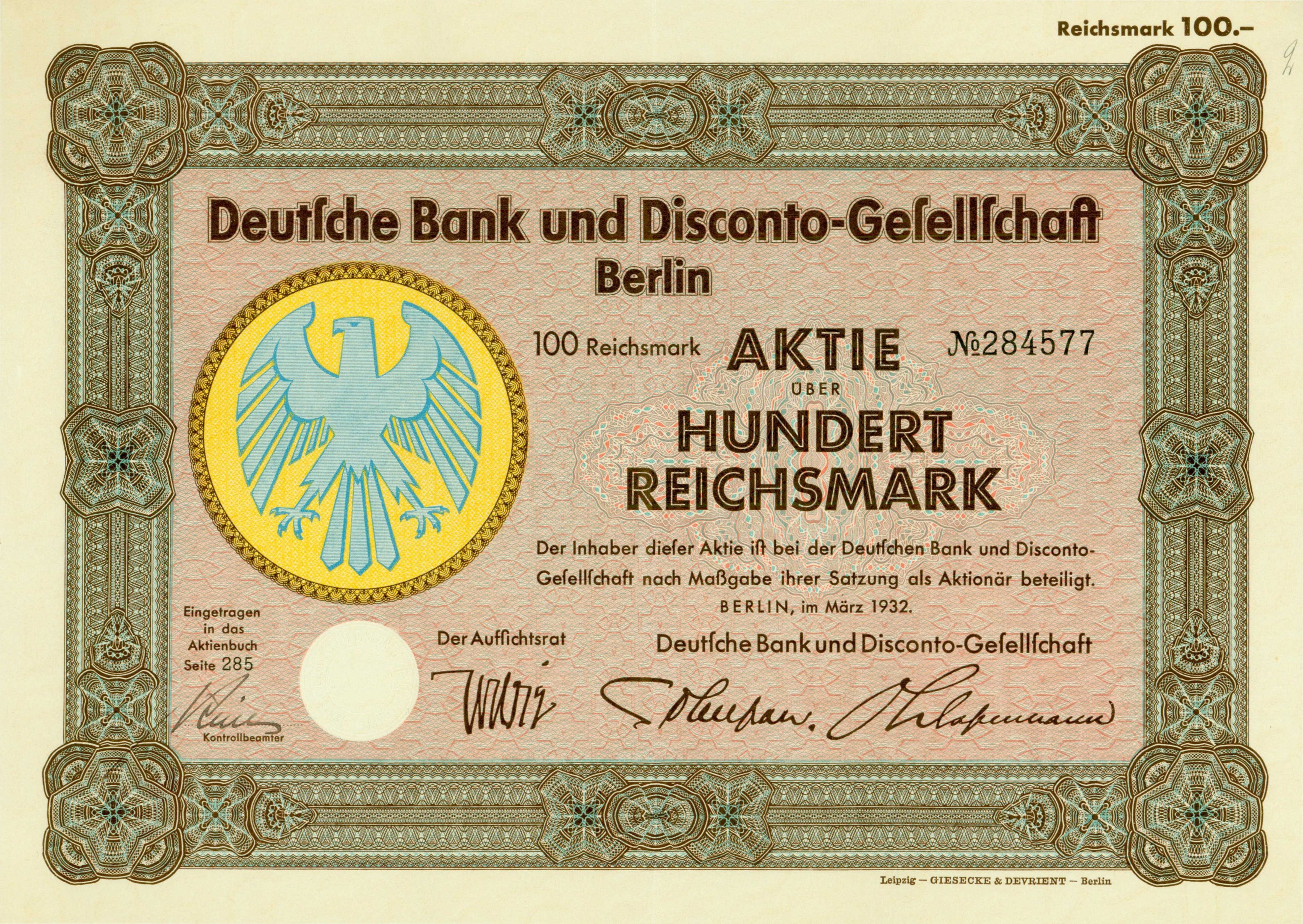 Alte deutsche Banknote mit einer Vogeldarstellung und dem Text "Deutsche Bank und Disconto-Gefellichaft Berlin" darauf.